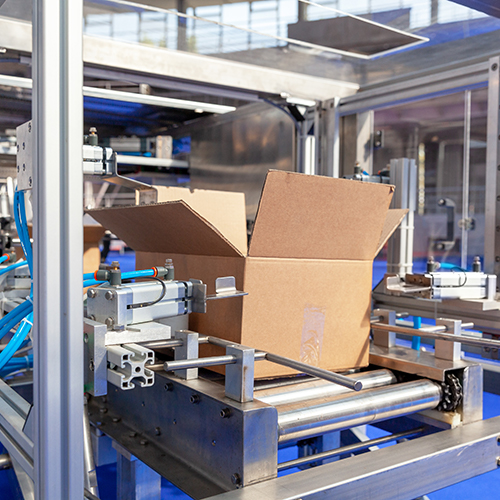 Conveyor belt with box in packaging industry